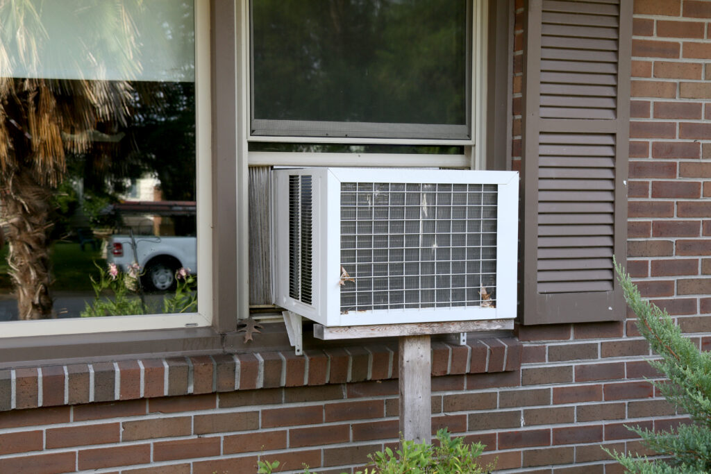 how to put air conditioner in window