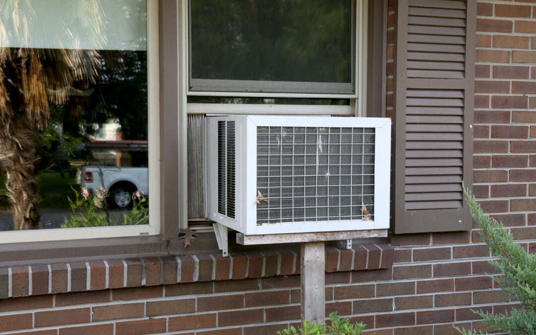 how do window air conditioning units work